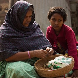 Women rolling beedi