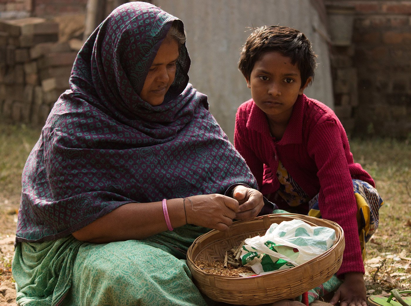 Women rolling beedi