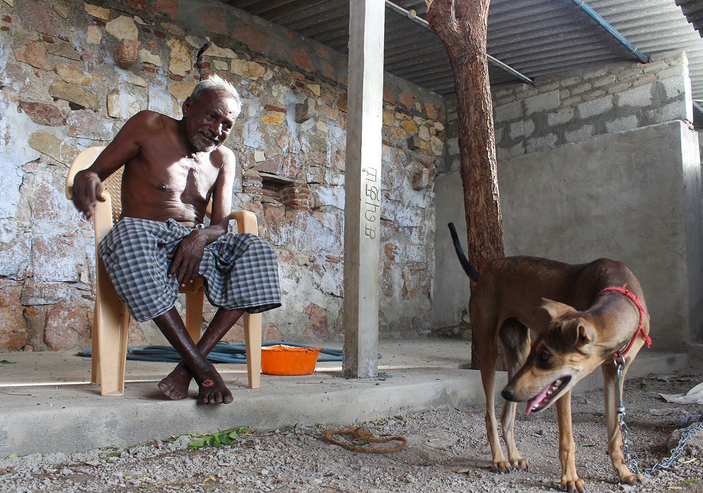 Kandasamy at his home with Rani