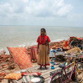 Cyclone Yaas brought Mousuni's lands underwater on May 26, a year after Amphan had hit the Sundarbans. PARI visited the island and found people saving what they could of their damaged homes and livelihoods