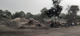 Scavenging for coal in Tamlabasti