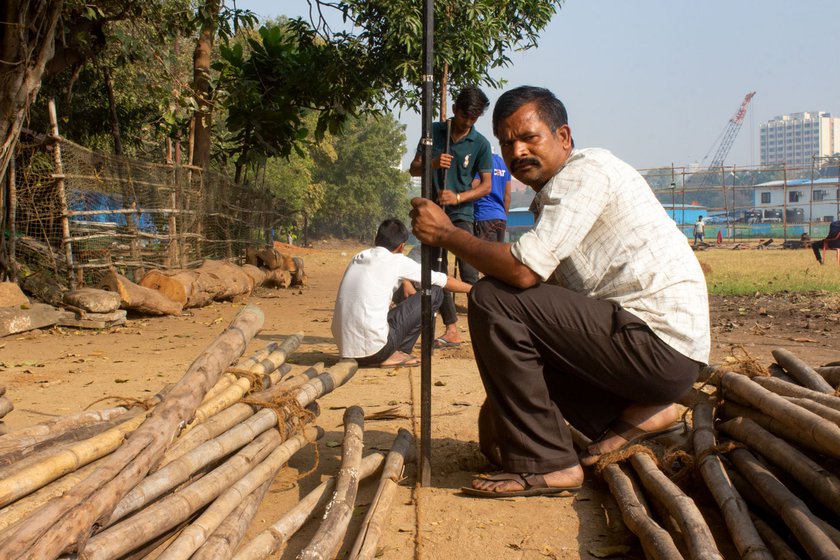 Ram Mohan has been working two days to pitch tents for the rally against the new farm laws in Azad Maidan, which he hopes to join