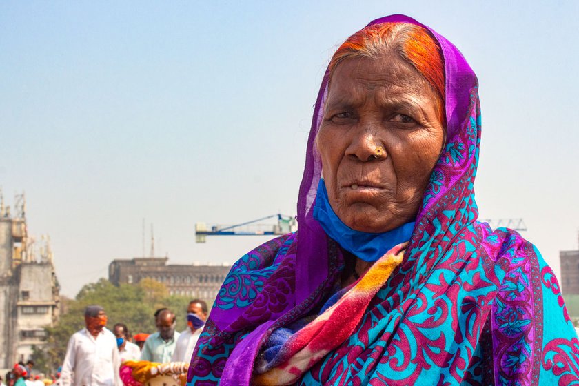 Left: Bhima Tandale at Azad Maidan. Right: Lakshmi Gaikwad (front) and Suman Bombale (behind, right) and Bhima came together from Ambevani village