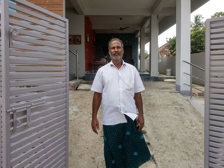 Ginjupalli Sankara Rao in front of his house. 