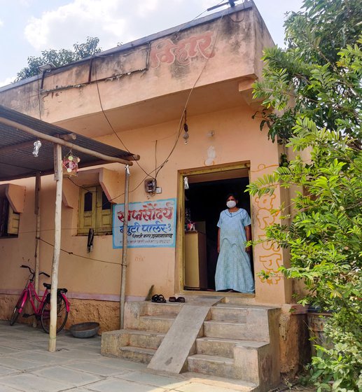 Jayashree Dhaware at her home store and beauty parlour (right). Her journalist husband, Harishchandra, died in April due to Covid