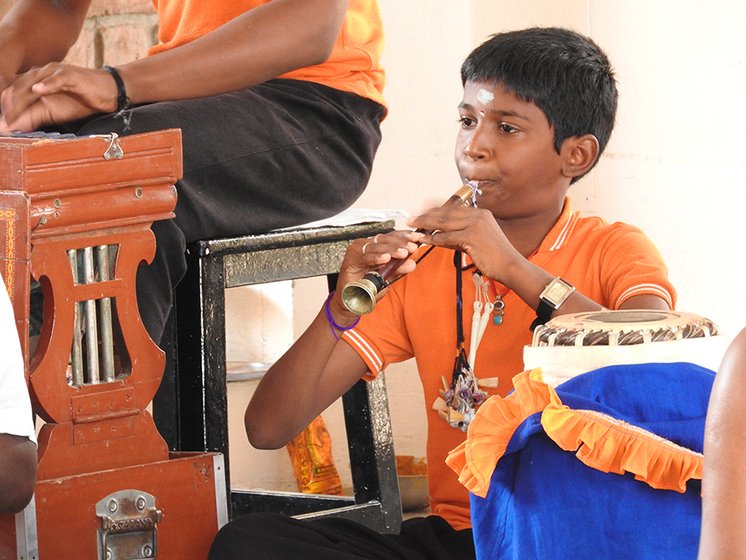 P. Sasikumar playing the mukavinai.