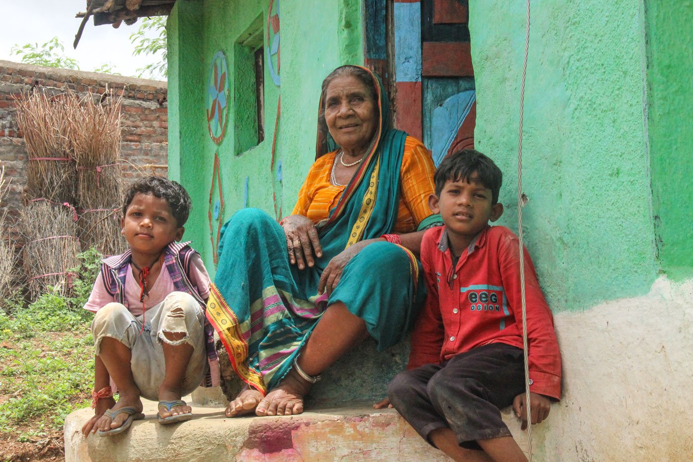 Ropi with her great grandchildren: her own children were all born at home, assisted by her mother and a dai