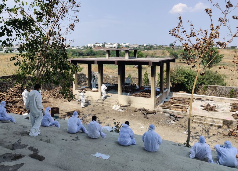 Family members sometimes skip a deceased relative's funeral out of fear of the virus; they ask municipal workers to conduct the basic cremation rituals