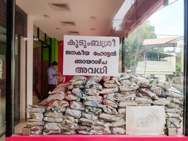 The lunch parcels, priced Rs. 20, are stacked on the counter. They are mostly bought by people left with barely any income in the lockdown

