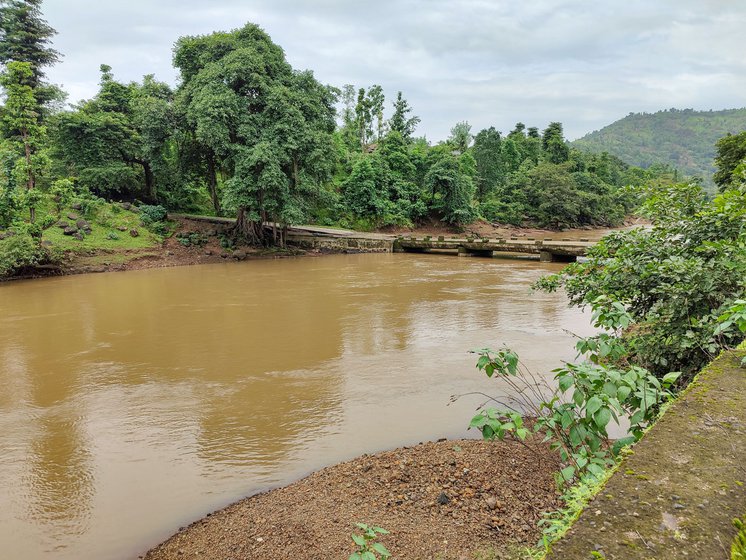 He and other villagers must cross this stream everyday to get home