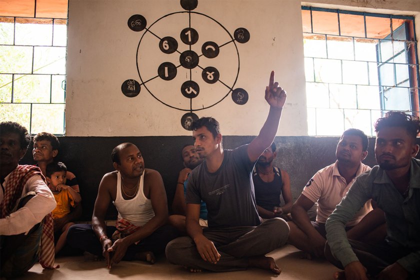 The construction of a school building in 2013-2014 was such a huge occasion for all of us,' says Deepak Malik (centre)