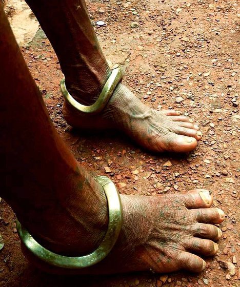 An Adivasi woman in Farsegarh village wearing traditional anklets