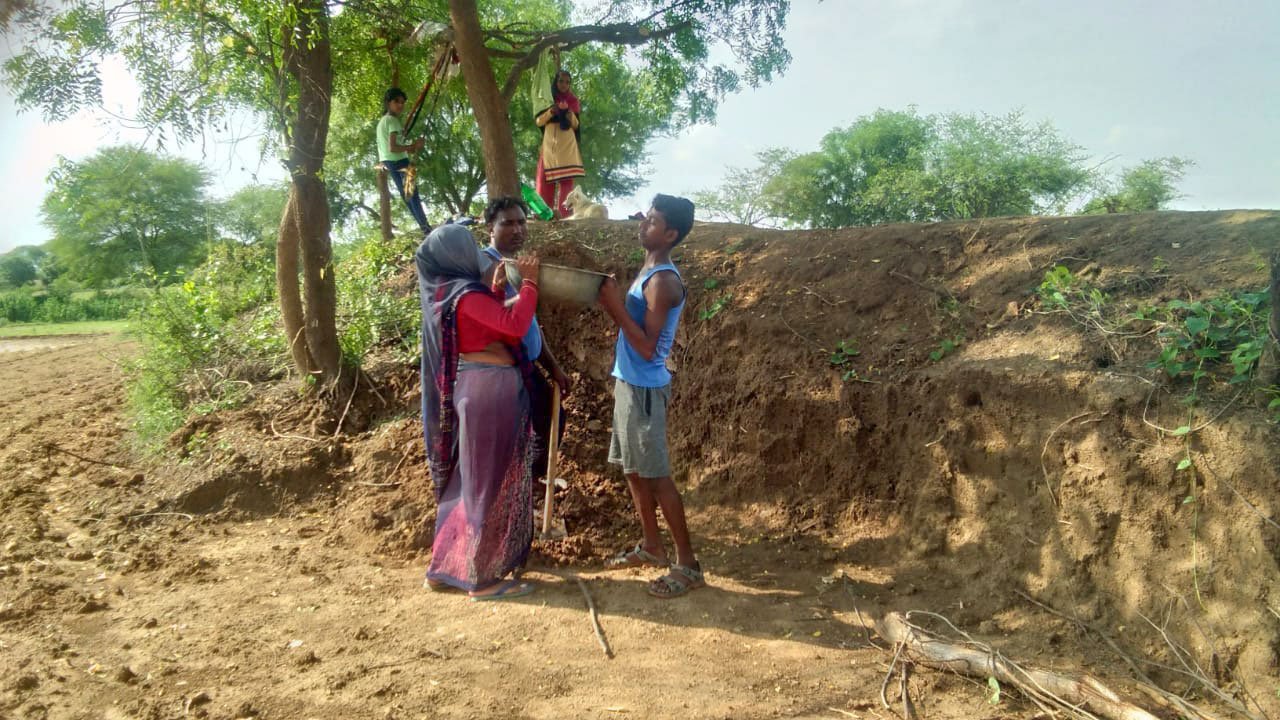 'It’s very difficult to work outside the house [in UP] because I have to wear a purdah', Ramdekali said – here, with Shivam (right) and Birendra Singh

