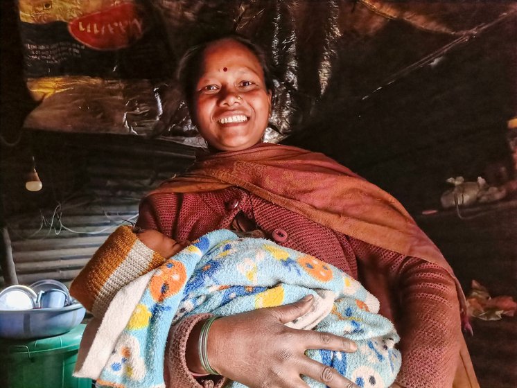 Anuradha inside her one-room house.