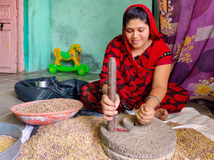 Mandakini (left) and Kalyani Salunkhe make puran polis for the devotees. The temple's closure gives them a break but it has ruined the family income