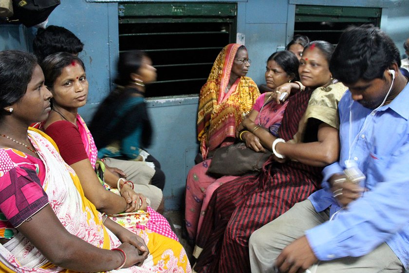 Breshpati Sardar sitting in the train early in the morning