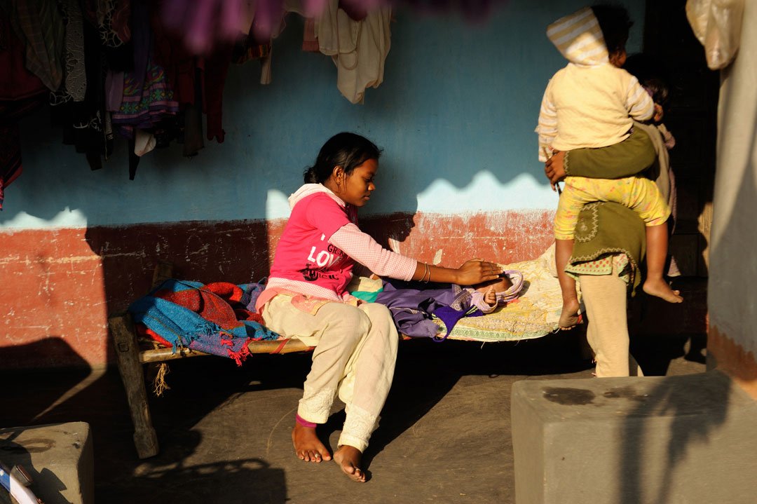 Anjali Mandi, 13, is a student in Class 7 at the school, as well as a babysitter for her younger siblings