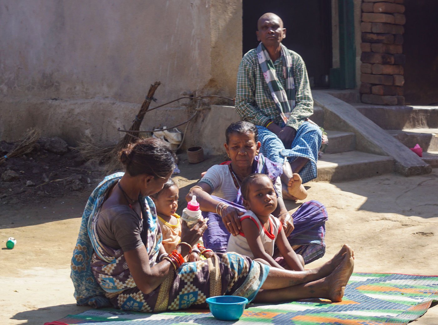 Tulsa's father Debanand at the doorstep of the family's home in Gudabheli. He and the others are yet to come to terms with their loss