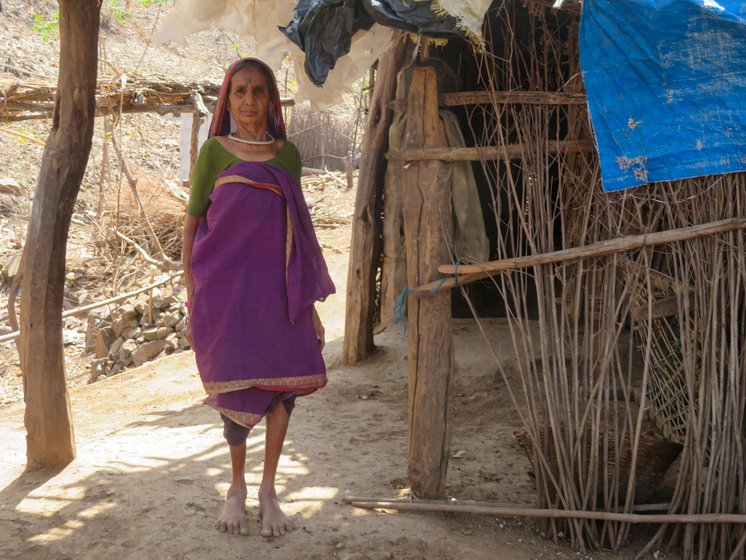 Bubali, 82, with her grandkids in the remote Chitkhedi hamlet. She and her husband are in an age bracket eligible for the vaccine, but, she says, 'Why should we be happy about the vaccine when we can’t walk to get one?'