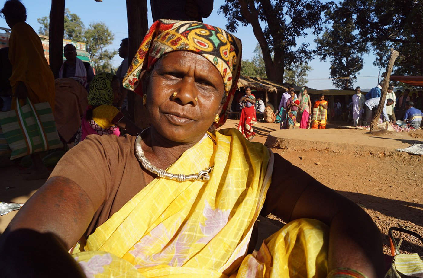 Mibai from Suklapal village has been coming to this market since she was a child. Today, she is selling beans and will buy some things to take home as well