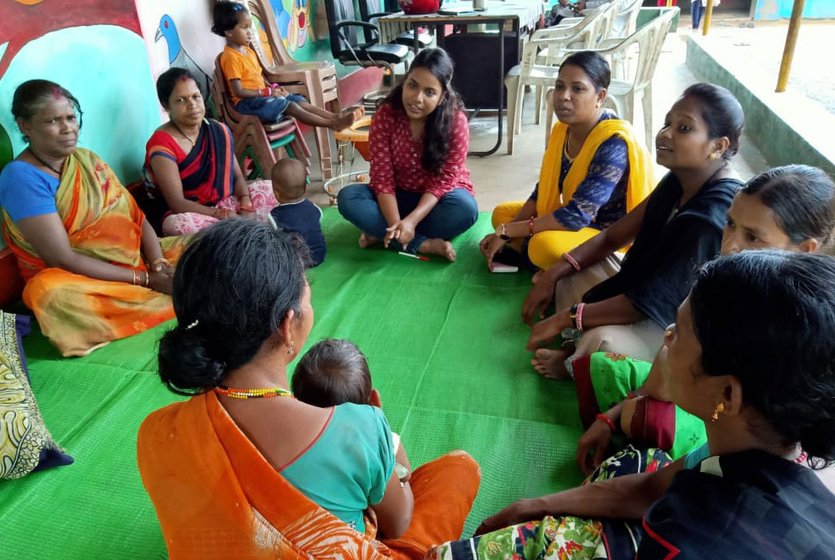 Left: Dr. Meenal Indurkar, district consultant for health in Narayanpur, speaking to young mothers about malnutrition. Right: Dashmati Yadav (with her husband Prakash and their baby girl), says, '...my baby boy died after birth at home. So this time my husband called the ambulance and I was taken to Benoor for my delivery'

