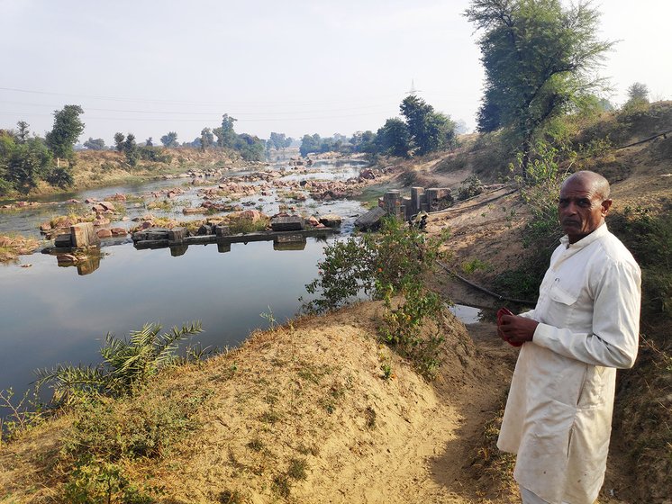 Shivdayal Rajput at one of the sites where the Mangal Turbine was installed. The broken check dam can be still seen