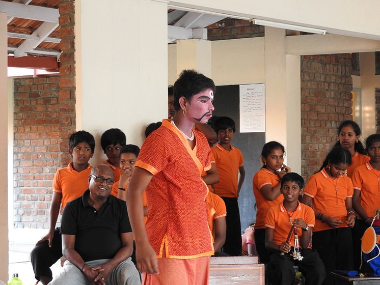 Left: A. Velan as the clown; teacher P. Rajagopal is seated behind