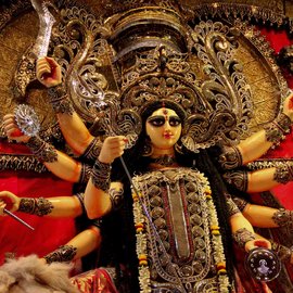 An idol of Ma Durga being readied