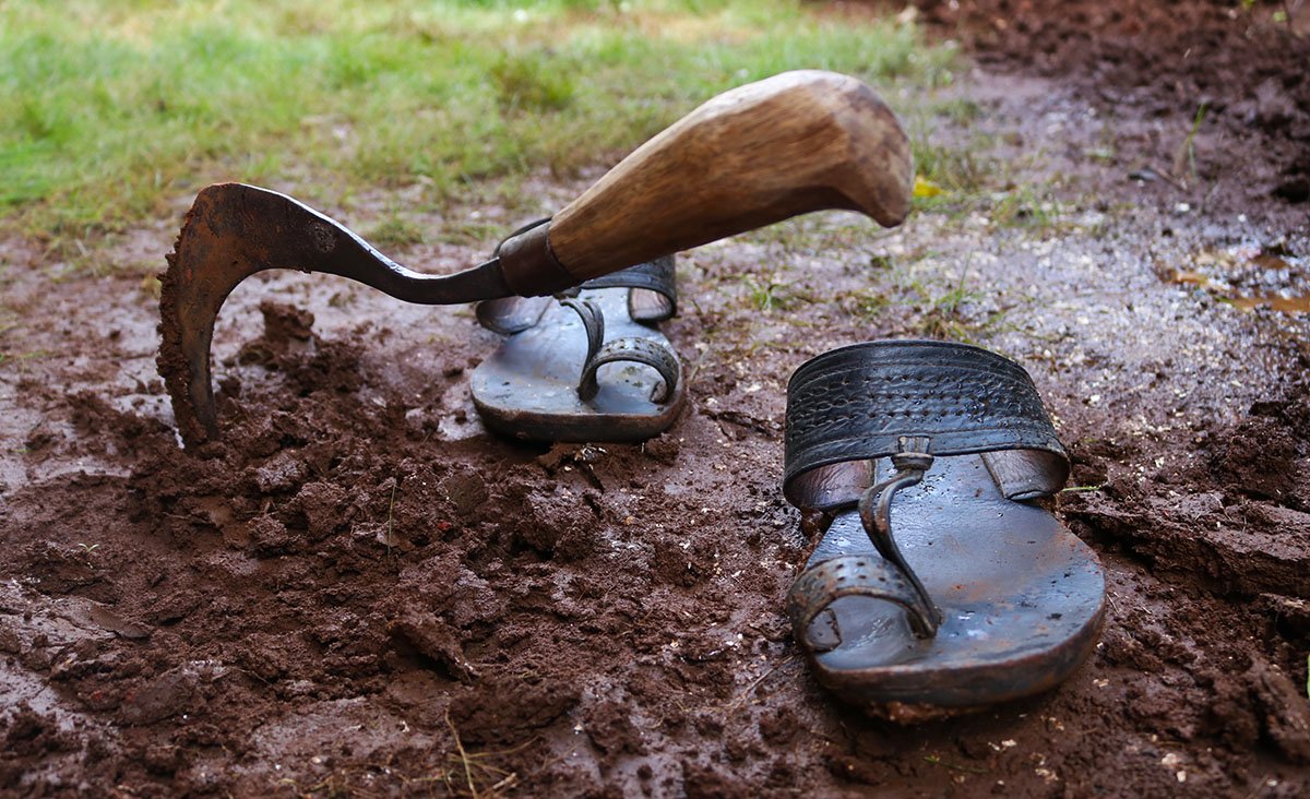 Maruti Nirmal's footwear and his sickle