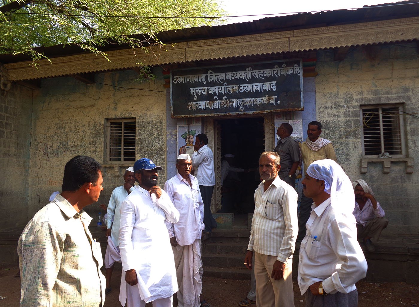 farmers outside the bank