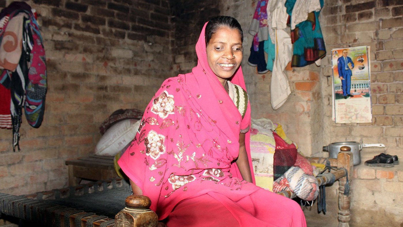 Woman sitting inside house