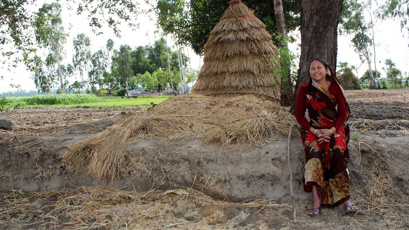 Woman sitting in field