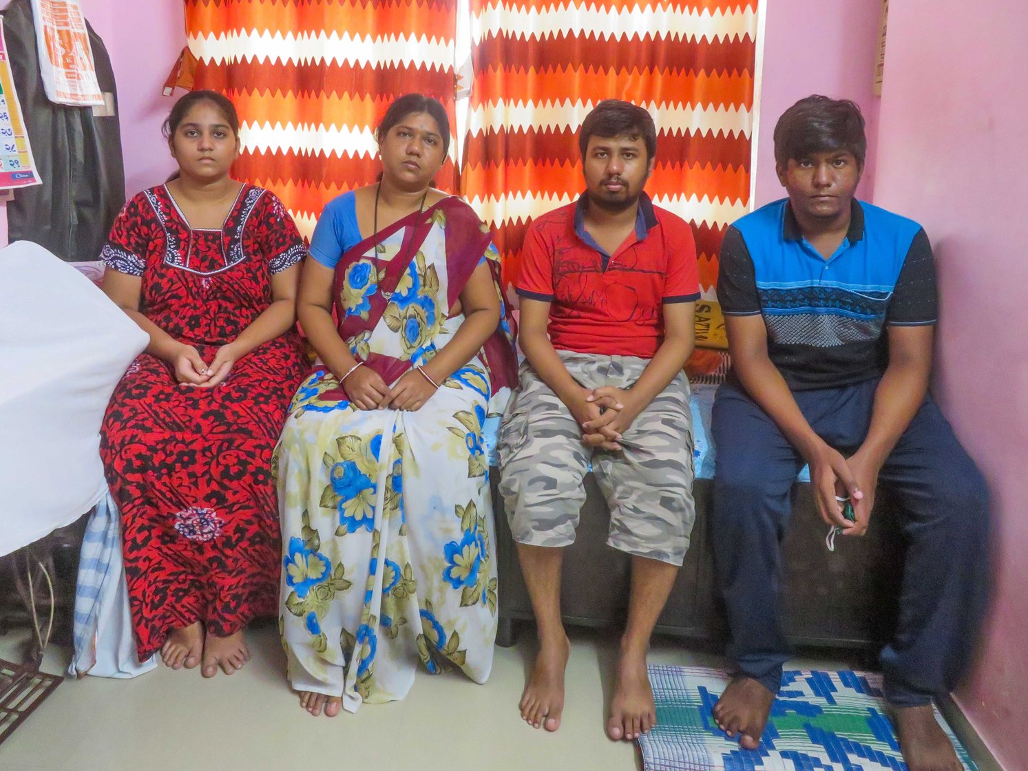 'If he [Ashok] was diagnosed in time, he would have been here', says Sunita, with her kids Manisha (left), Nikesh and Swapnil

