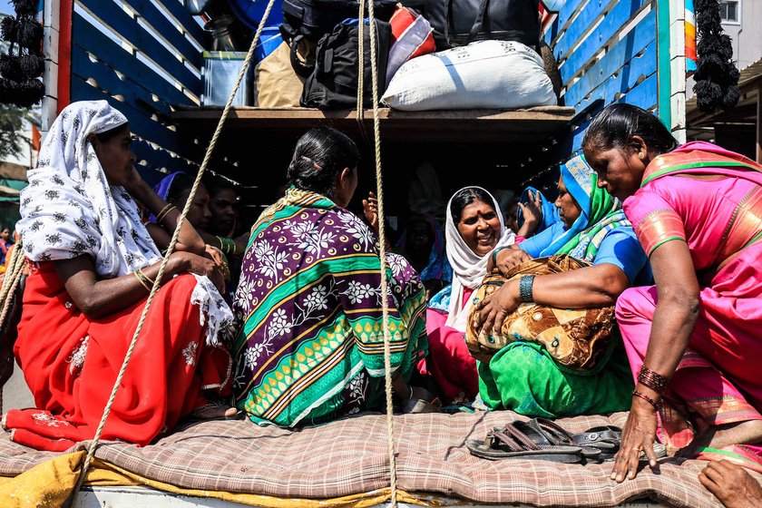 Women sitting in the truck. 