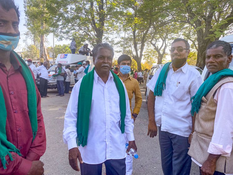 Left: D. Mallikarjunappa (centre), a farmer from Shivamogga. Right: Groups from across Karnataka reached Bengaluru for the protest rally