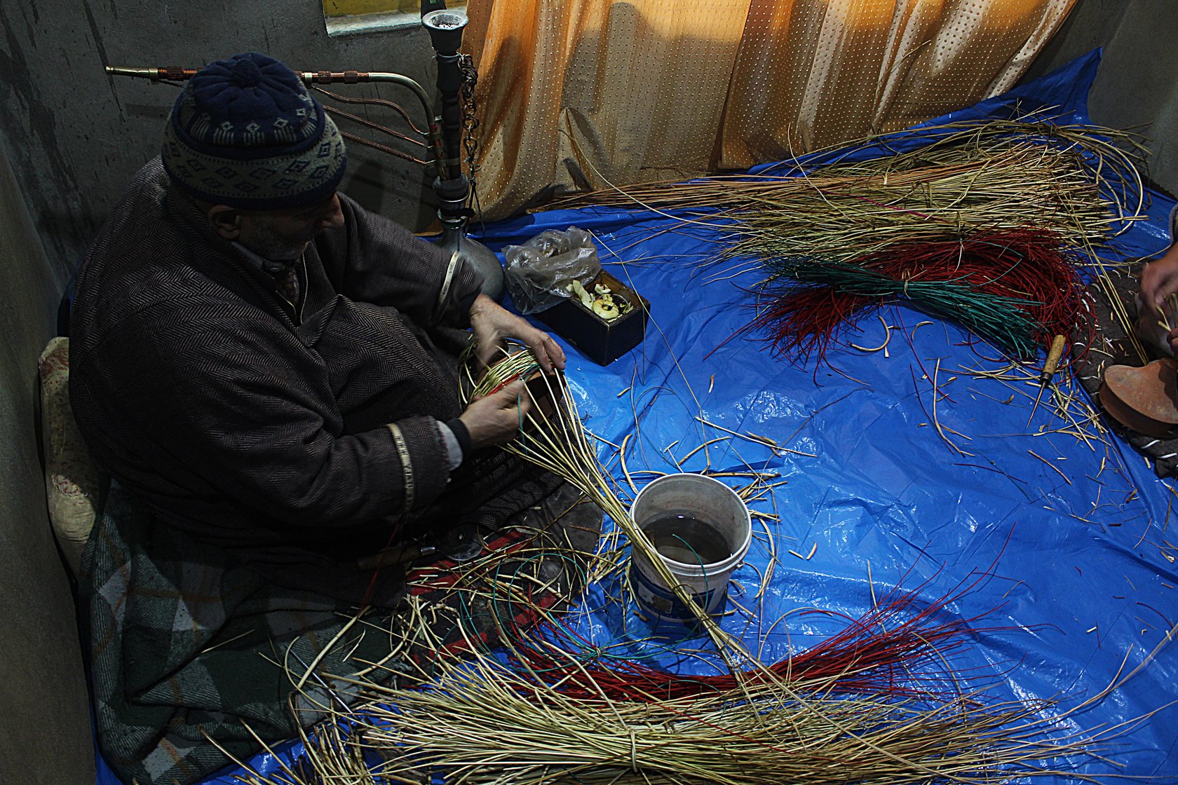 Ghulam Nabi Malik, 64, a resident of Kanil mohalla in Charar-i-Sharief, says “I learned weaving from my father. He used to tell me that if you are not skilled enough you cannot even make the handle of a kangri. It took me nine years to learn to weave a perfect kangri'
