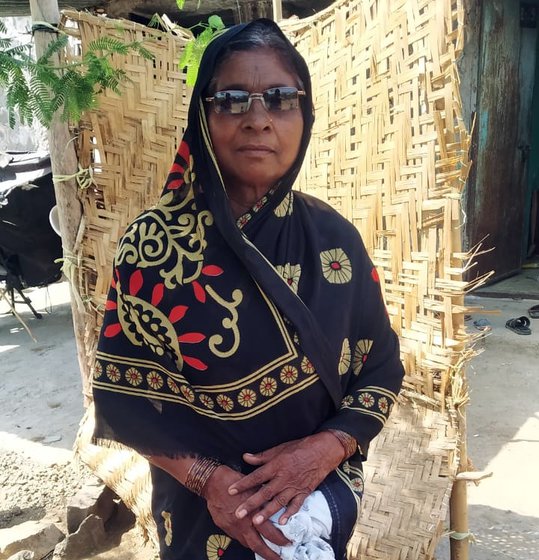 Radha Borhade in April 2017. Her daughter Kamal Salve (right) says Radhabai knows many songs devoted to Buddha