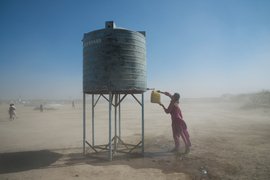 At a 'watering hole' in the arid Banni grasslands