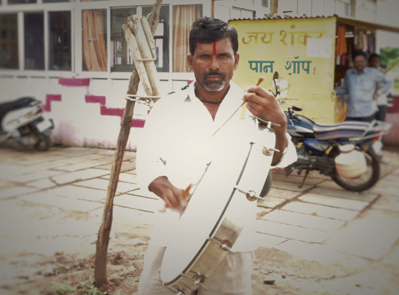 Tanaji Kailas Kadam playing his drum