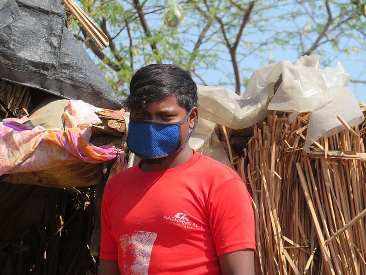 With no hospital bed available, Amol Barde isolated himself in this neighbour’s hut with a broken door, damaged roof and stone-strewn floor