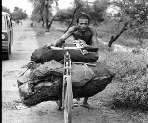 A coal carrier carrying coal on a cycle