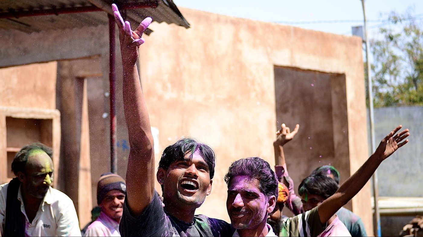 Group of people playing Holi