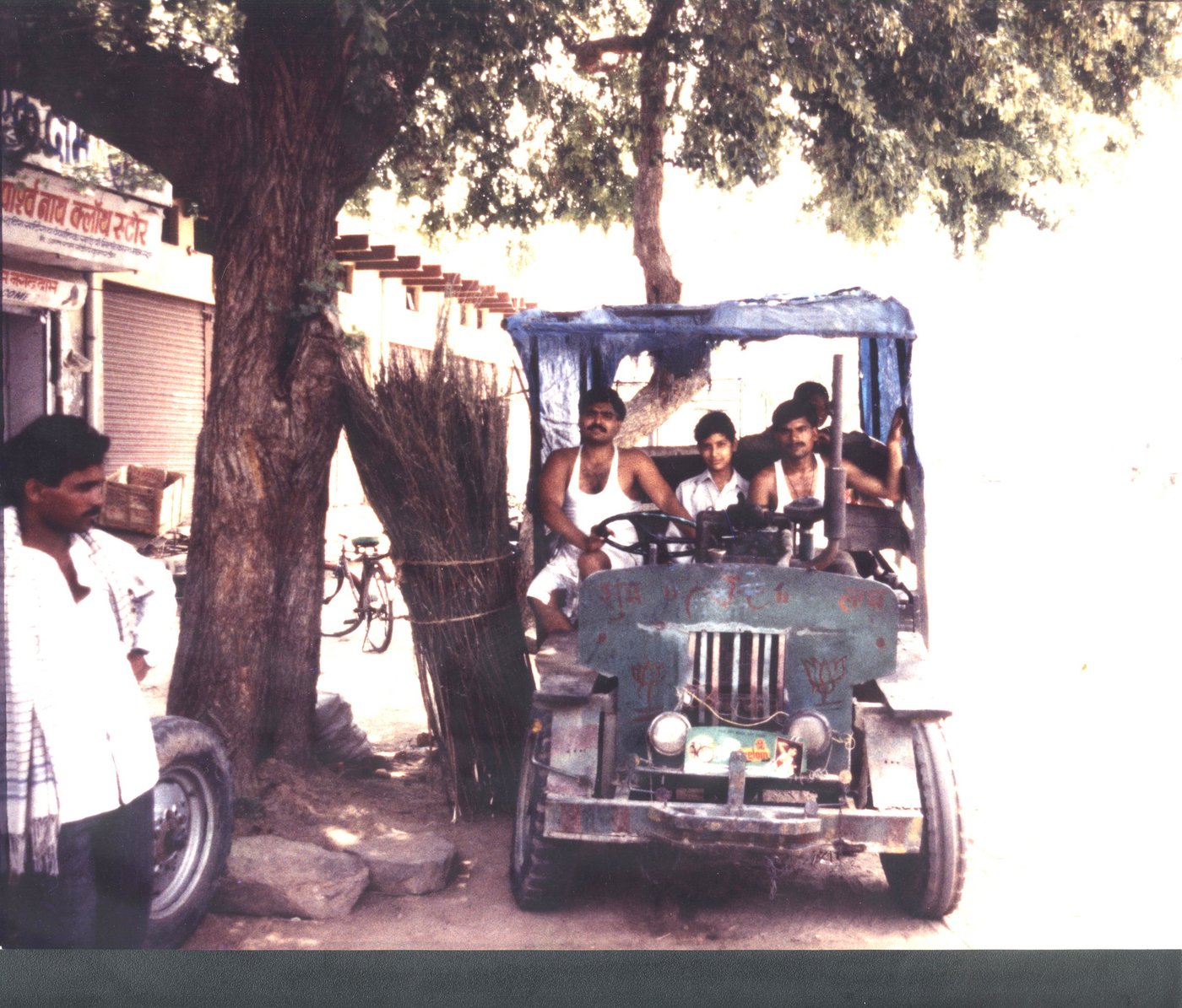 Group of men with make-shift car