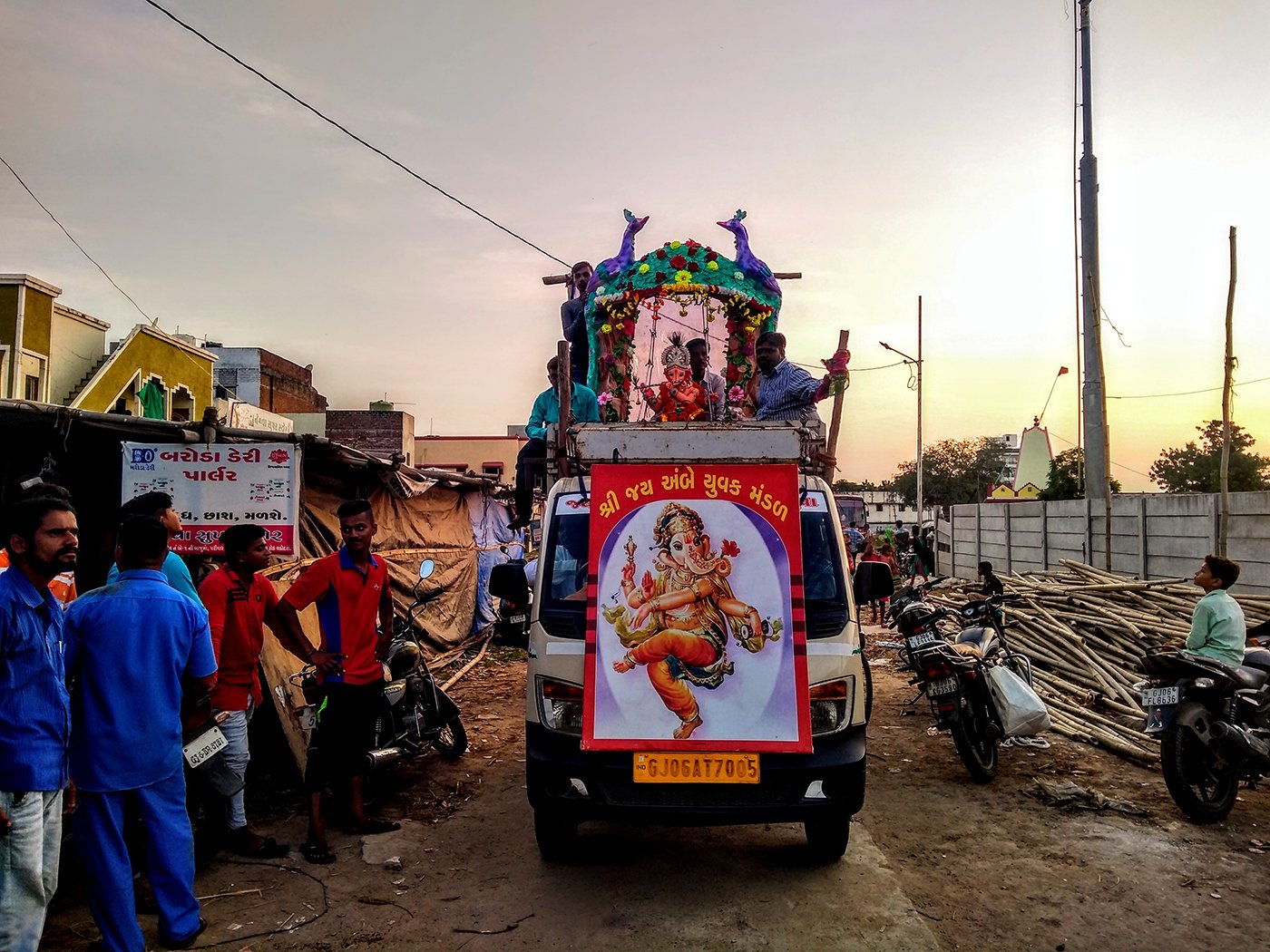 People welcoming ganpati